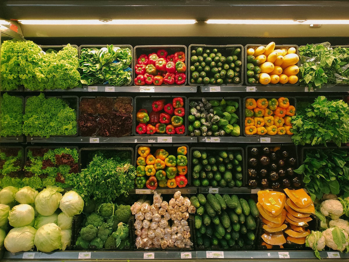 Fresh grocery store display with vegetables and fruits